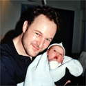 Noa with her father, 20 minutes old.